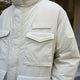 MANUAL ALPHABET×NANGA  FIELD DOWN JACKET