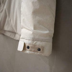 MANUAL ALPHABET×NANGA PCS DOWN SMOCK