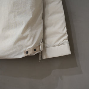 MANUAL ALPHABET×NANGA PCS DOWN SMOCK